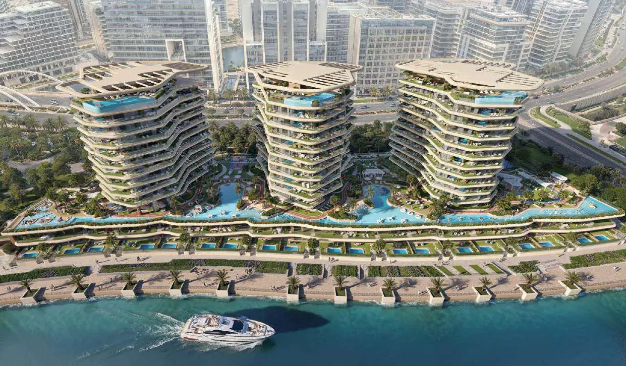 Modern curved architectural glass facade of Bab Al Qasr Residence 51 in Al Raha Beach Abu Dhabi with waterfront views.