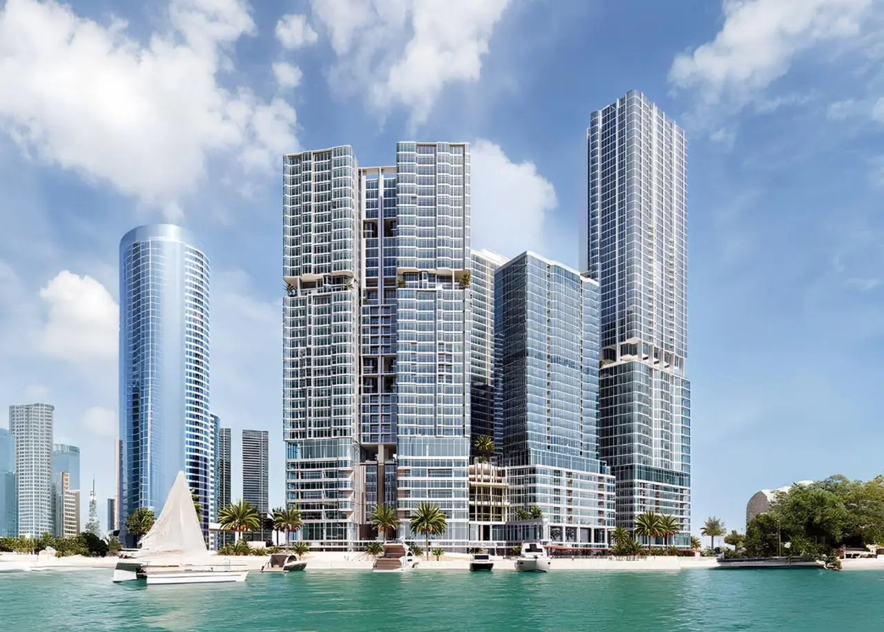 Contemporary glass entrance and retail podium level at Radiant Bay tower in City of Lights, Al Reem Island, Abu Dhabi.