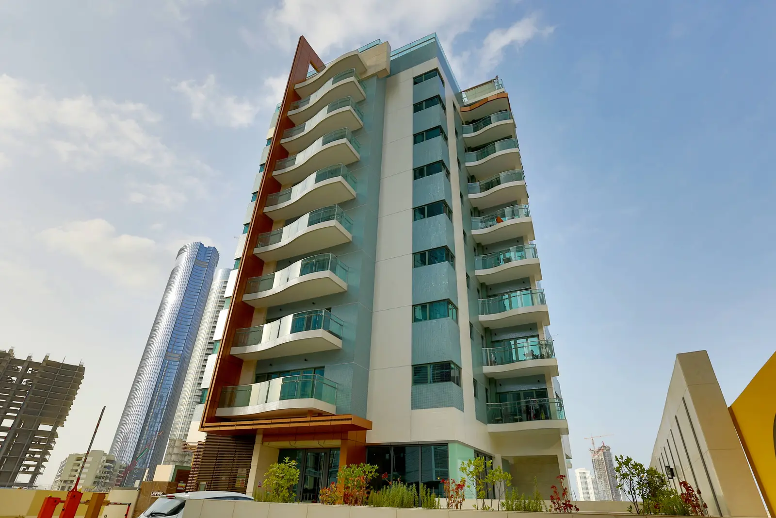 Contemporary architectural exterior of Azure residential tower in Shams Abu Dhabi on Al Reem Island overlooking pristine coastal waters