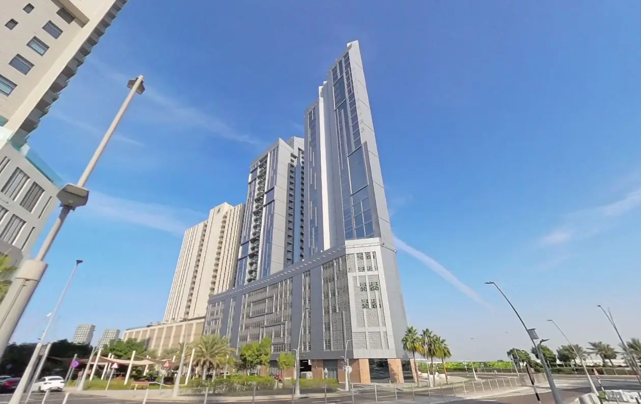 Modern main entrance drop off and landscaped podium plaza at Al Jeel Towers on Al Reem Island Abu Dhabi.