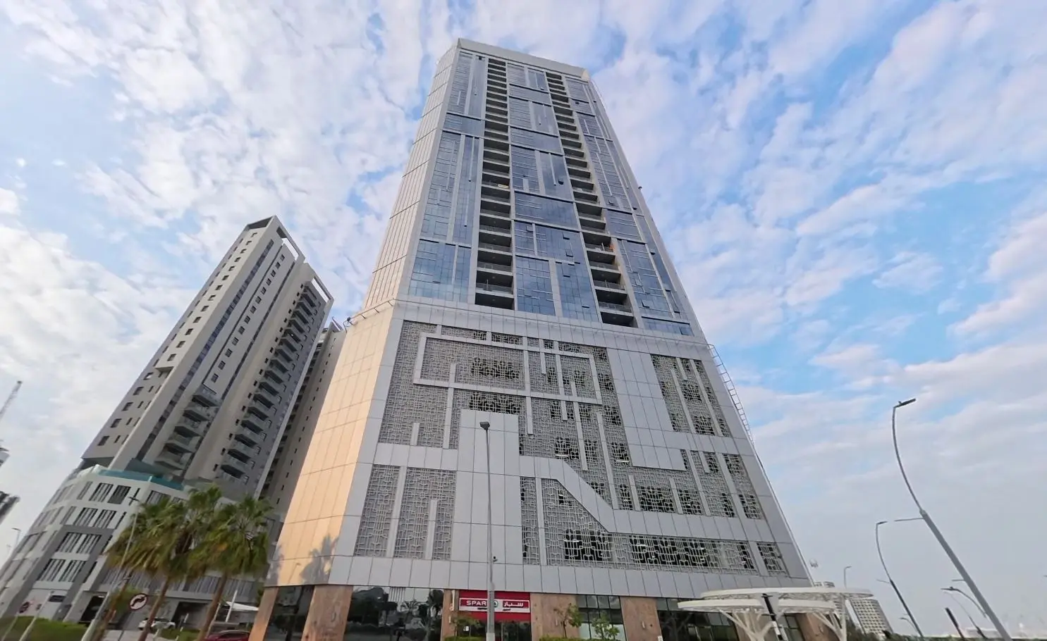 Rooftop swimming pool and sun deck lounge area at Al Jeel Towers in Shams Abu Dhabi Reem Island.