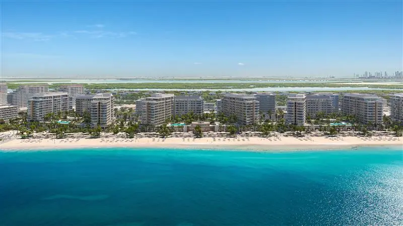 Aerial view of Fahid Beach Terraces Abu Dhabi, showcasing luxury apartments, retail promenade, and landscaped community spaces by the water..jpg