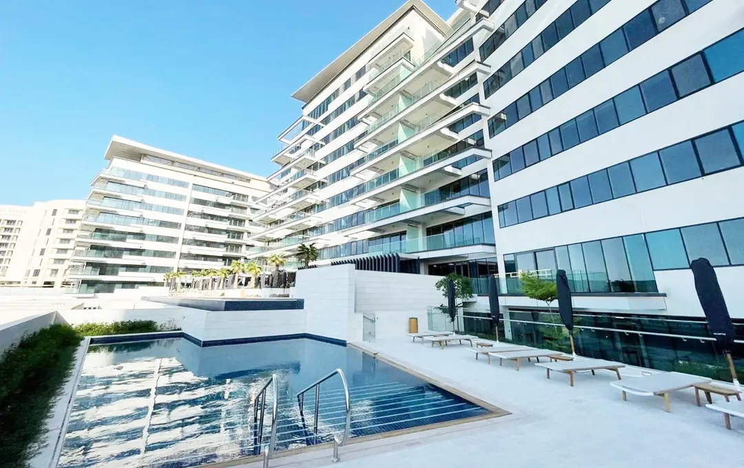 Exterior of Mayan Yas Island Abu Dhabi apartments featuring sea views and golf course surroundings.jpg