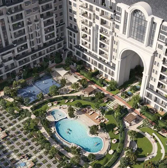 Building exterior surrounded by lush landscaped greenery at Bab Al Qasr Garden Residence 66 Masdar City Abu Dhabi offering serene outdoor spaces for residents.jpg