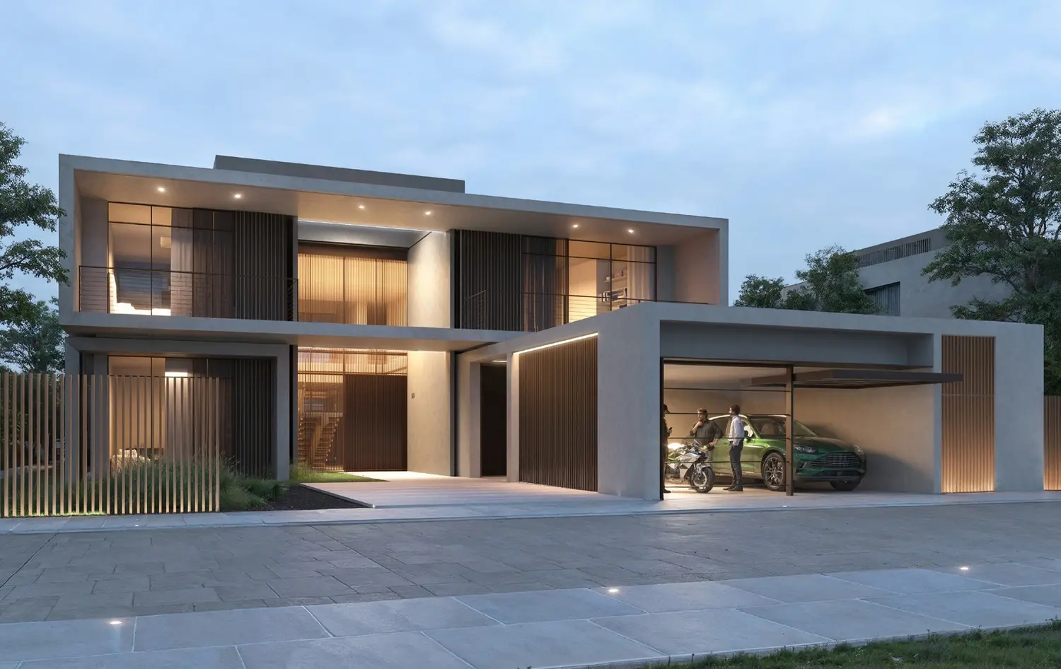 Evening exterior of Naseem Al Jurf luxury residences with illuminated facades and landscaping