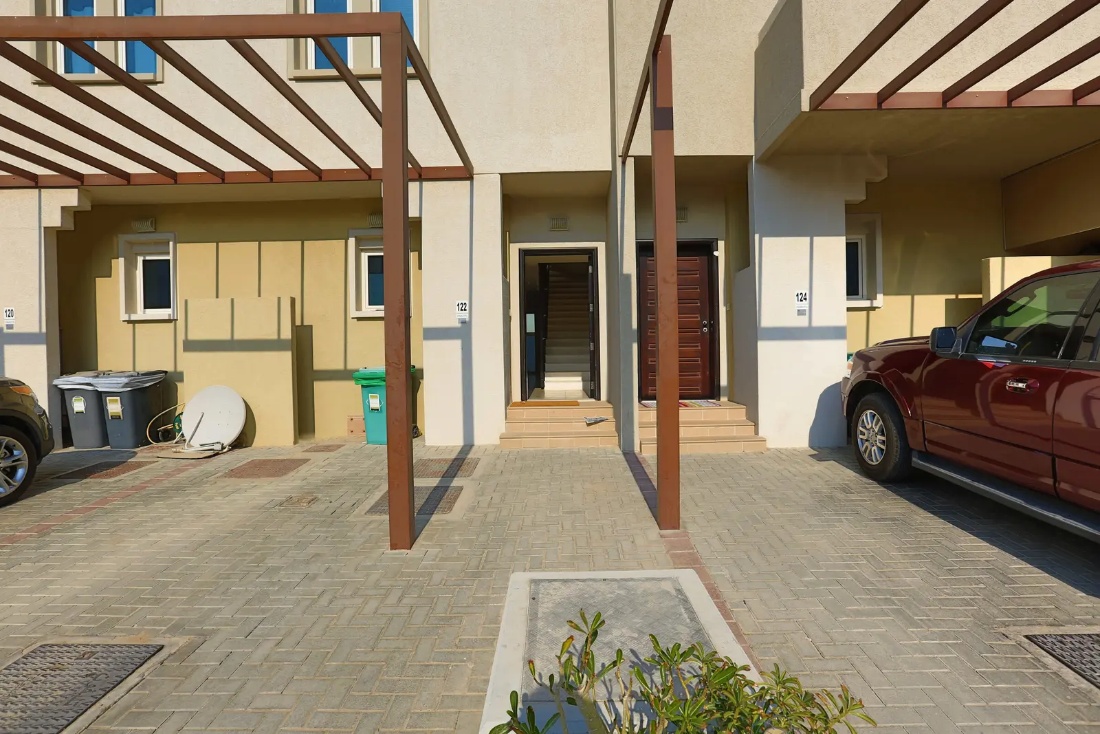 Modern apartment building exterior at Al Reef Downtown, Al Reef Abu Dhabi reflecting contemporary architecture and investment value for buyers