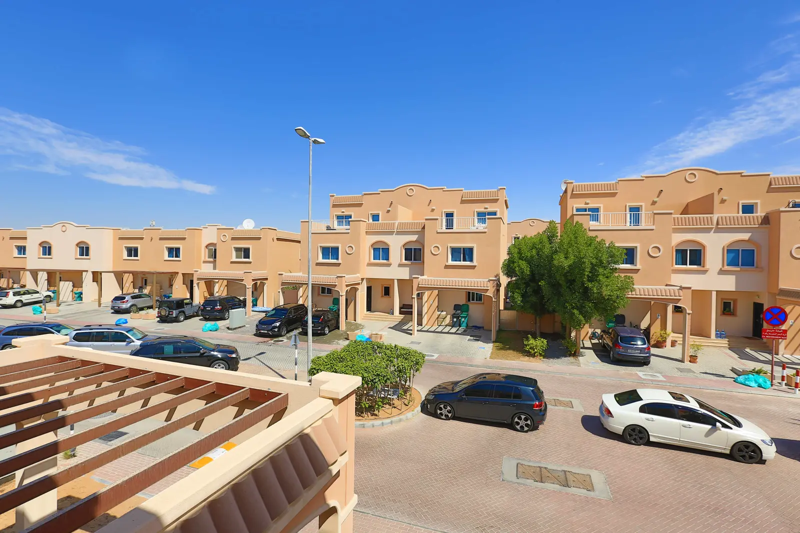 Secure gated entrance at Al Reef Downtown Abu Dhabi featuring controlled access and premium residential community infrastructure for safety