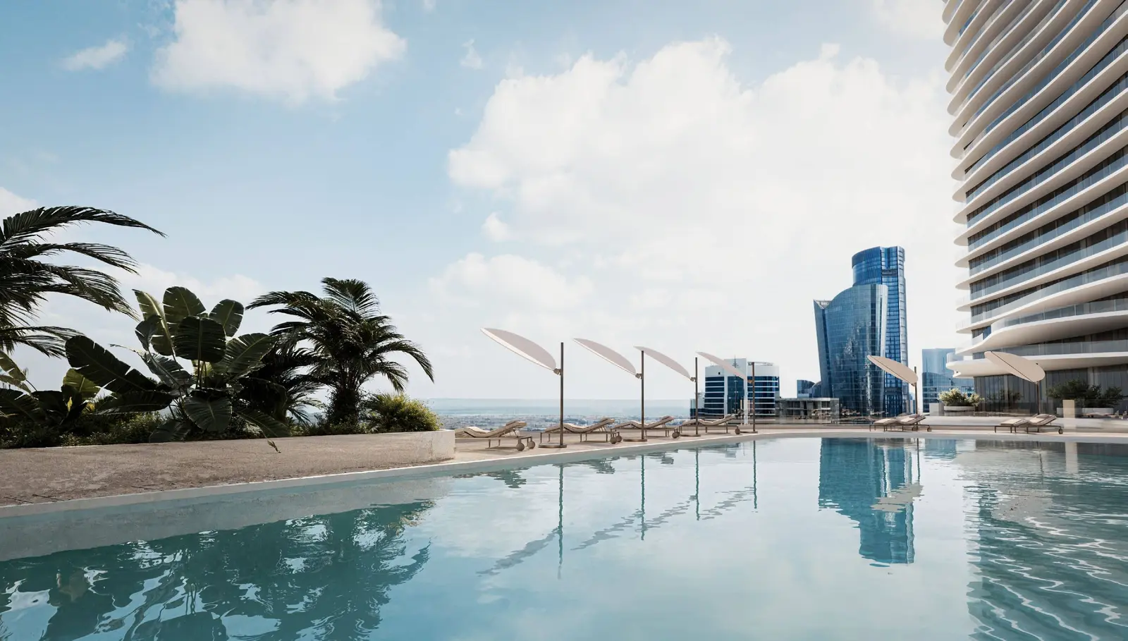Exterior view of SAAS Heights luxury apartments Al Reem Island Abu Dhabi featuring sky bridge connecting twin residential towers.