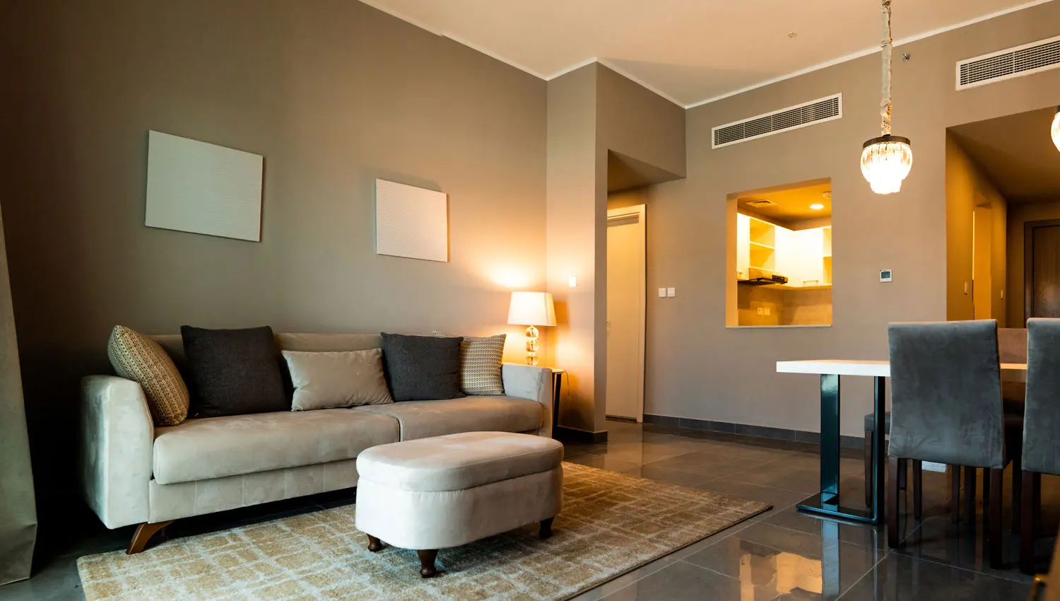 Leonardo Residences bedroom interior in Masdar City Abu Dhabi featuring modern apartment design and elegant living space.jpg
