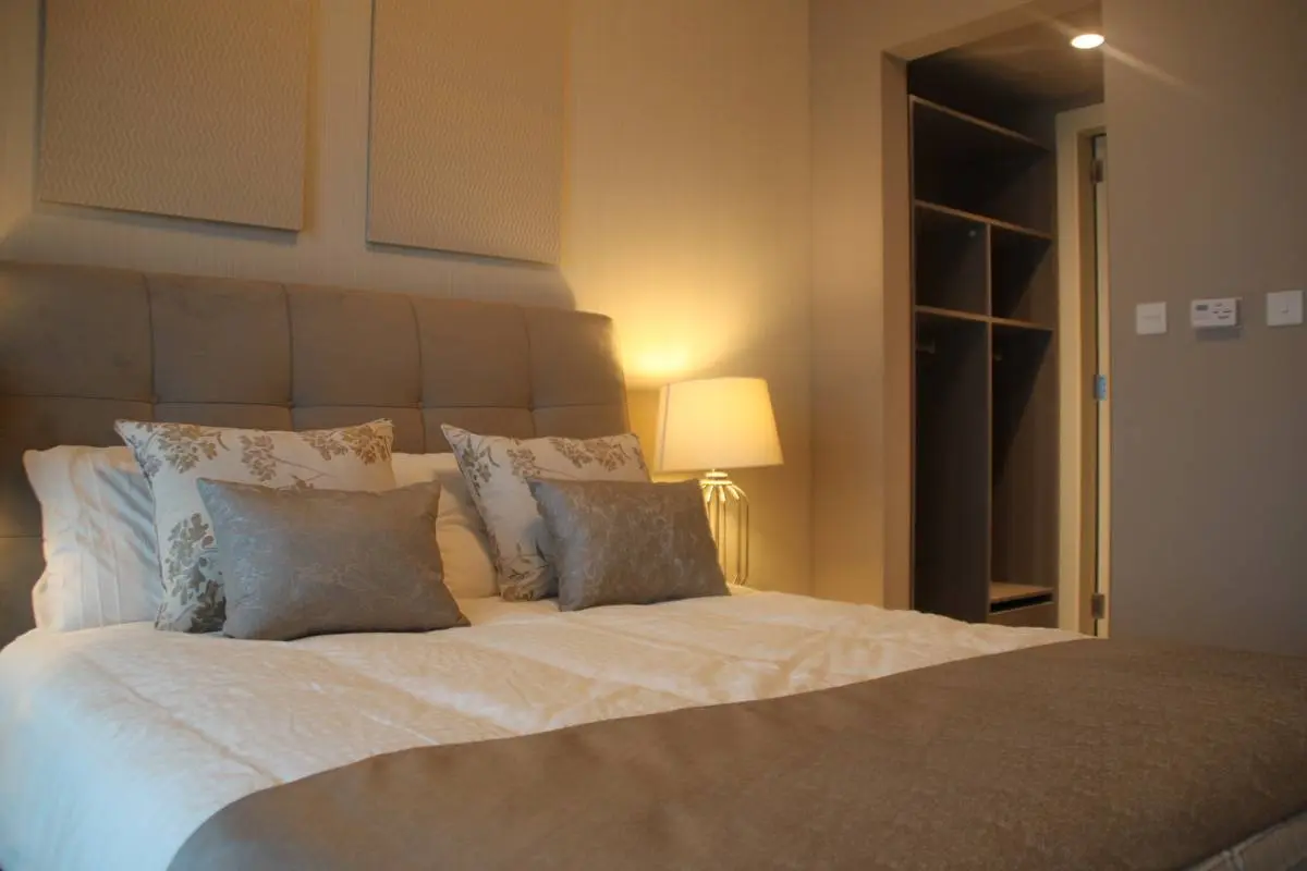 Leonardo Residences master bedroom in Masdar City Abu Dhabi featuring stylish interiors and modern design.jpg