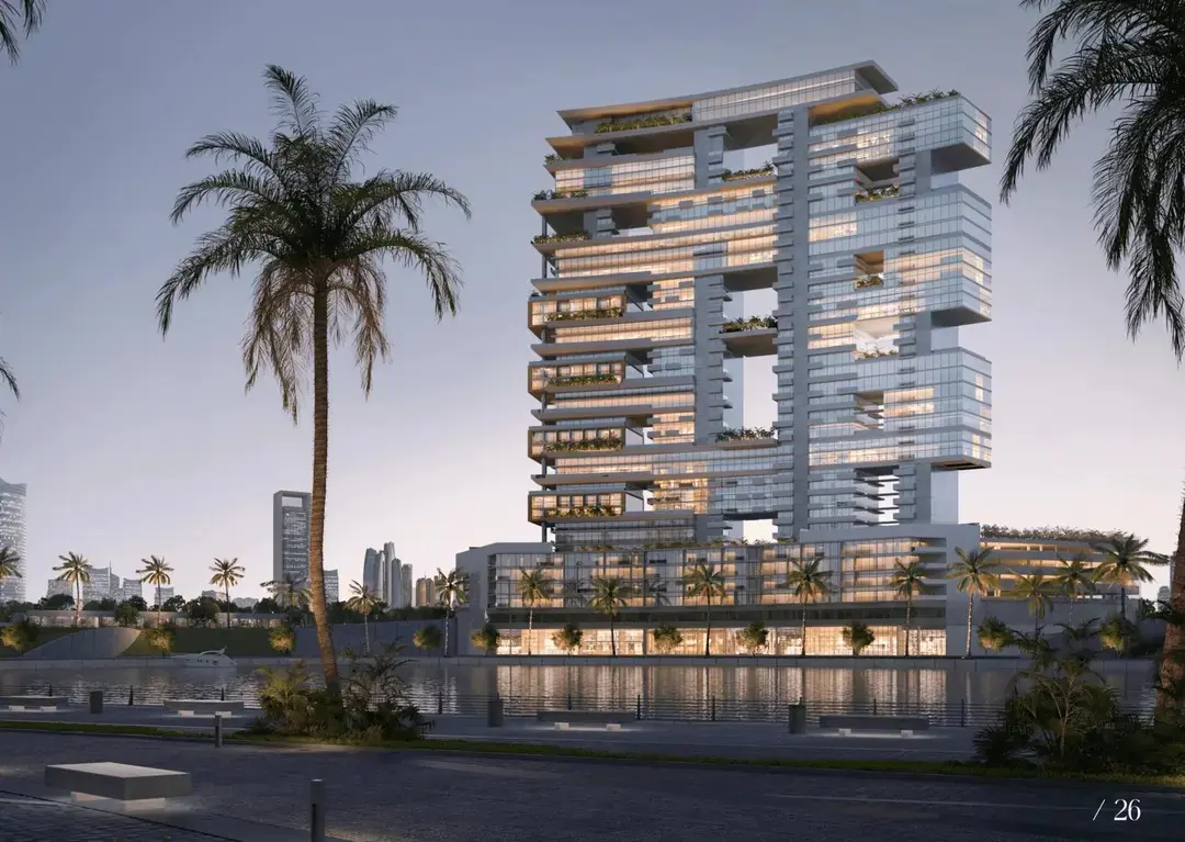Panoramic view of Radiant Marina Towers with marina, canal, and landscaped surroundings at sunset.jpg
